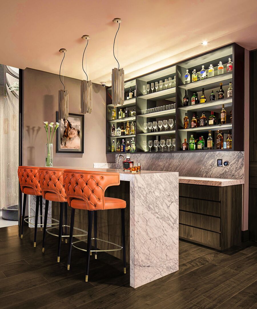 colourful bar design with orange curved back bar chairs