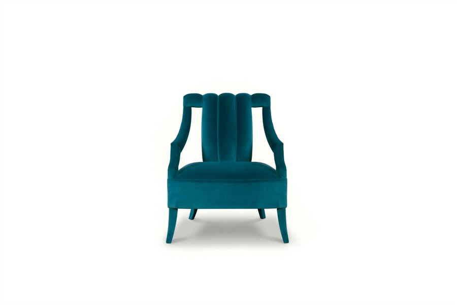 modern classic chair upholstered in blue velvet