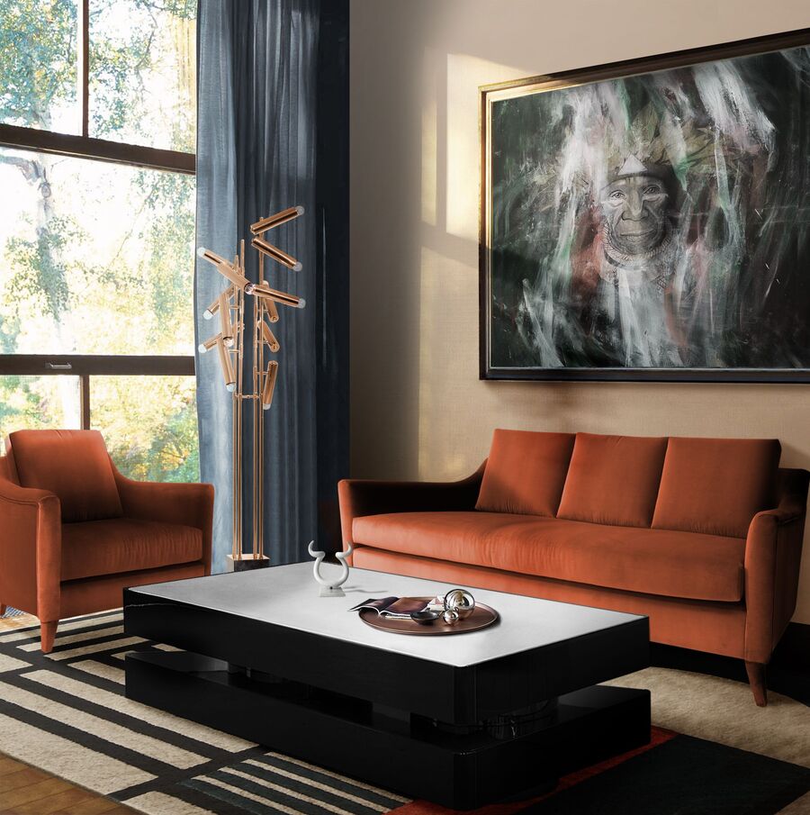Buying Guide modern living room with orange armchair and sofa