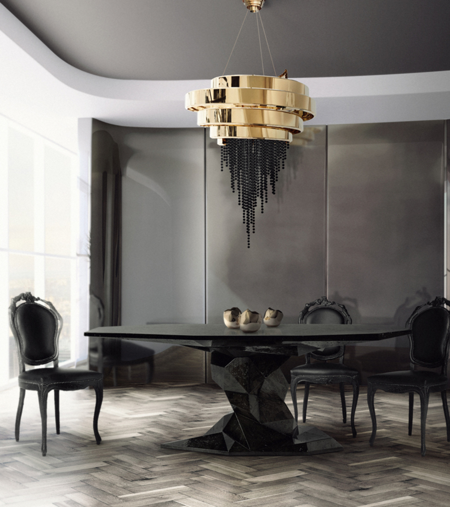 sophisticated dining room in black shades with golden chandelier