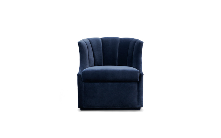 swivel armchair with round back in blue velvet